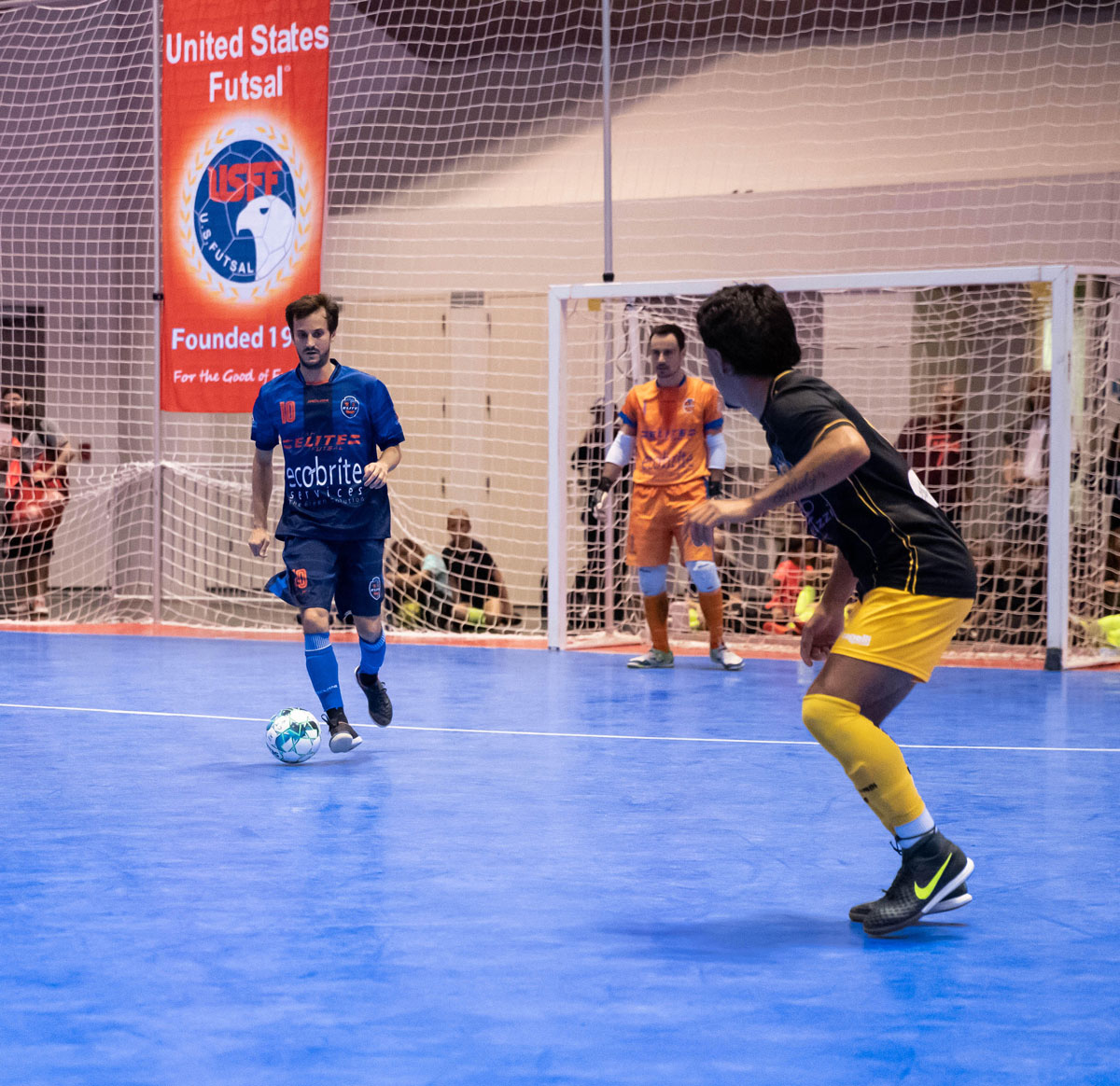 Men playing futsal