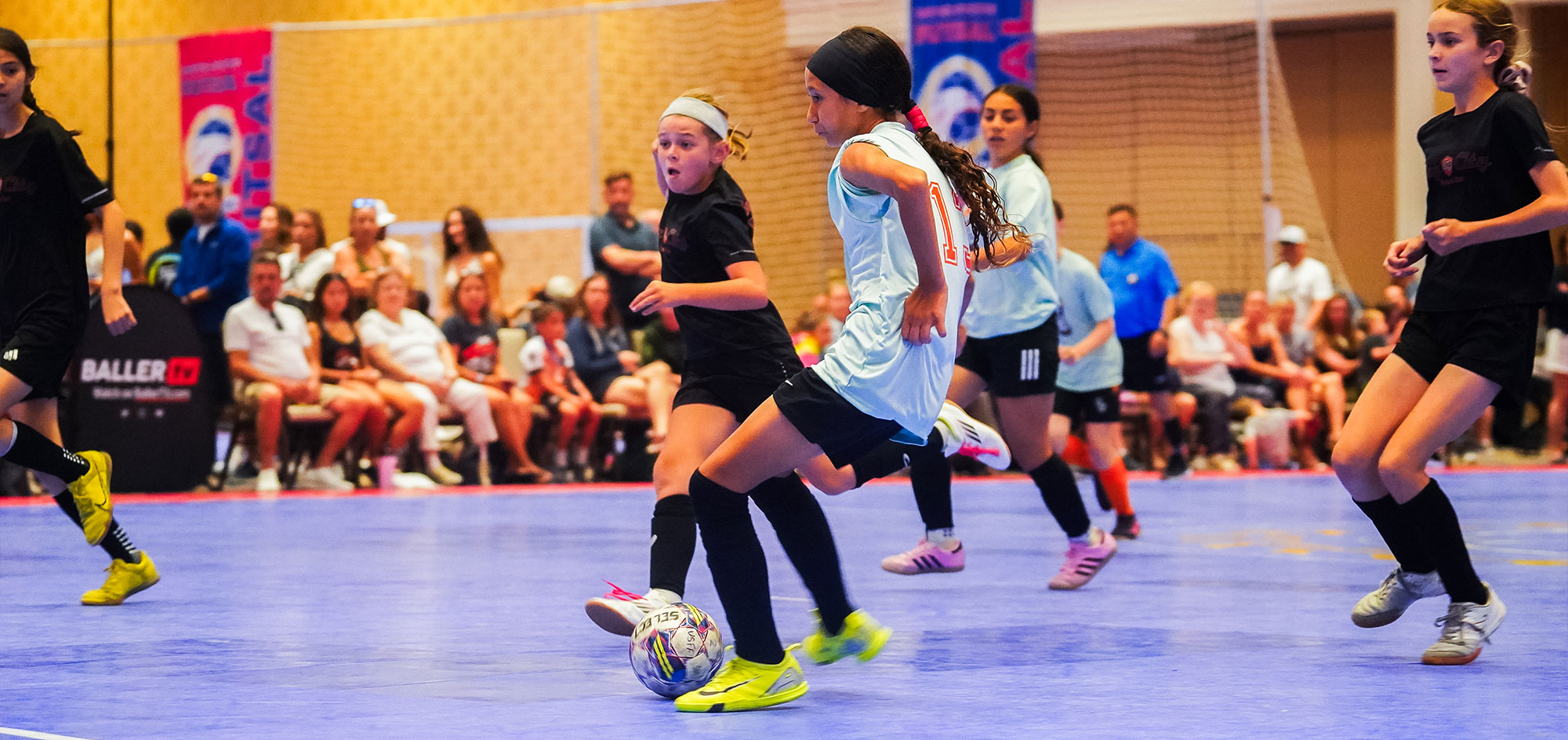 Youth girls futsal soccer game